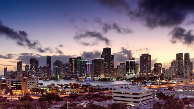 A photo of the Miami skyline at dusk.